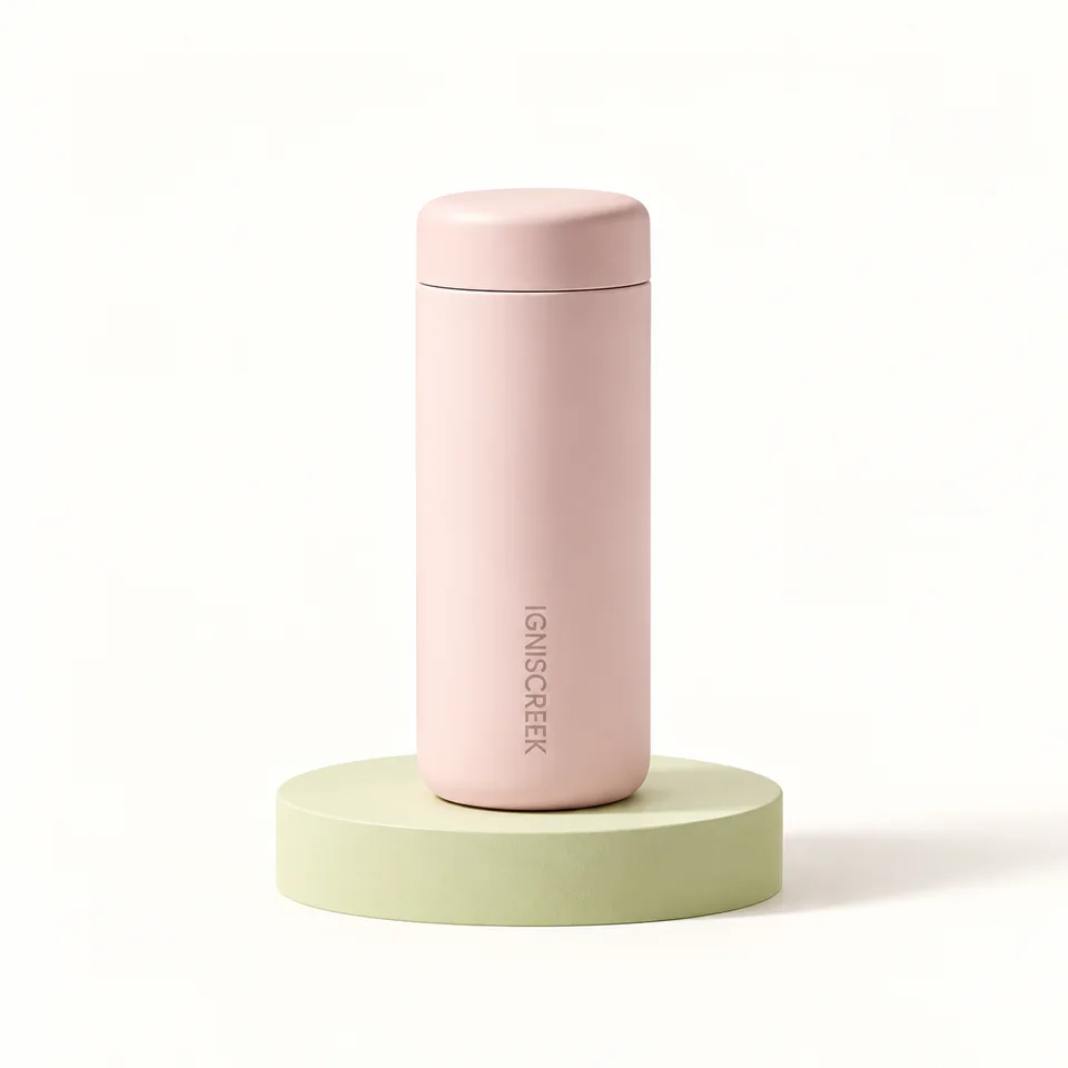 IGNISCREEK — mini bouteille rose 350 ml — Mini bouteille rose fermée ; détails séparés du bouchon non représentés.